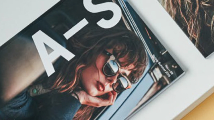 Cover of an Altitude Sports catalogue featuring a model wearing sunglasses.