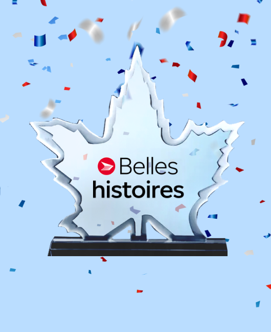 Dans un nuage de confettis multicolores, un trophée en forme de feuille d’érable affichant l’inscription « Les belles histoires » et le logo de Postes Canada.